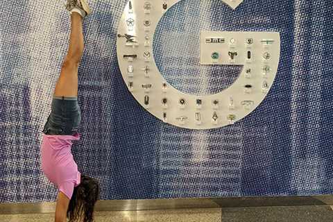 Handstand By The Google Detroit Logo